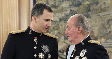 Spain rushes through legal shield for ex-king