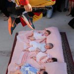 Babies born within the last 12 months are able to participate in this tradition that dates back to 1620.Photo: Cesar Manso / AFP.