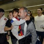 'Gracias España': Syrian tripped up by camerawoman arrives in Madrid
