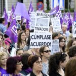 Women take to the streets in Spain demanding funds to fight domestic violence