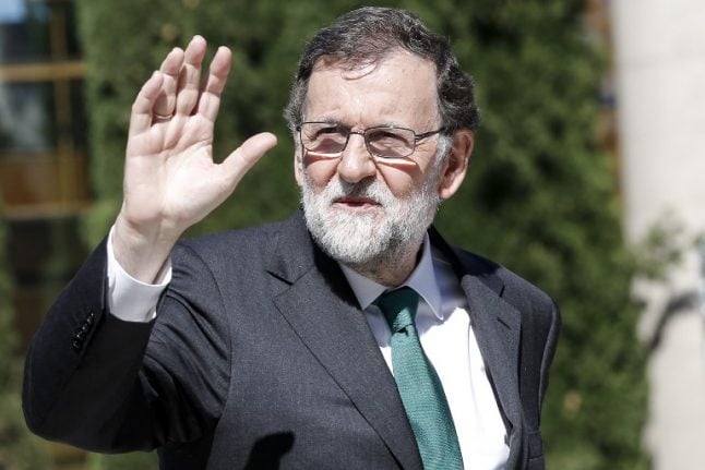Spain's ousted PM Rajoy bids emotional farewell to PP party