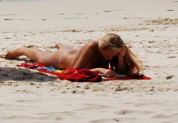 Spanish women resist European trend to ditch topless sunbathing