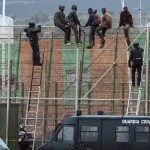 Dozens scale border fence into Spain's North African enclave Melilla