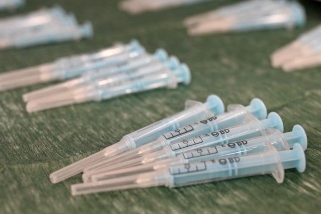 Syringes are pictured in an itinerant vaccination truck in Spain.