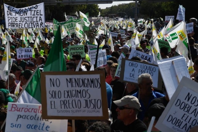 Demonstrators take part in a 2019 protest in Madrid, called by the olive sector