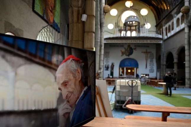 A photo of Justo Gallego Martinez on display at his cathedral following his passing. (Photo by Gabriel BOUYS / AFP)