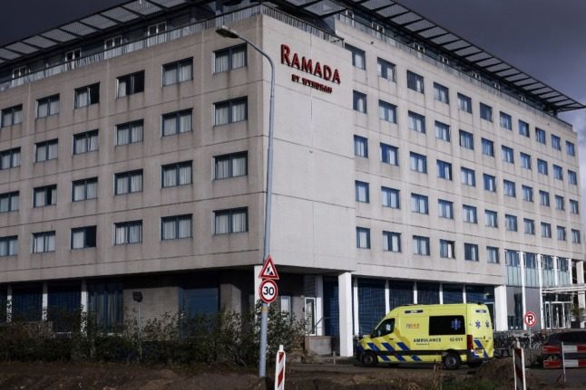 The Ramada Hotel where Dutch authorities have isolated 61 passengers who tested positive after arriving on two flights from South Africa. Photo: Kenzo TRIBOUILLARD/AFP