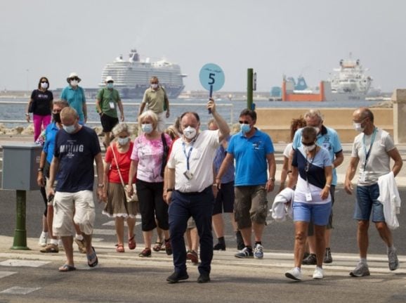 Tourists of the cruise ship 'Mein Schiff 2' of the German travel giant TUI visit Palma de Mallorca, on June 17, 2021.