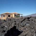 Spain's La Palma residents return home to battle volcano ash